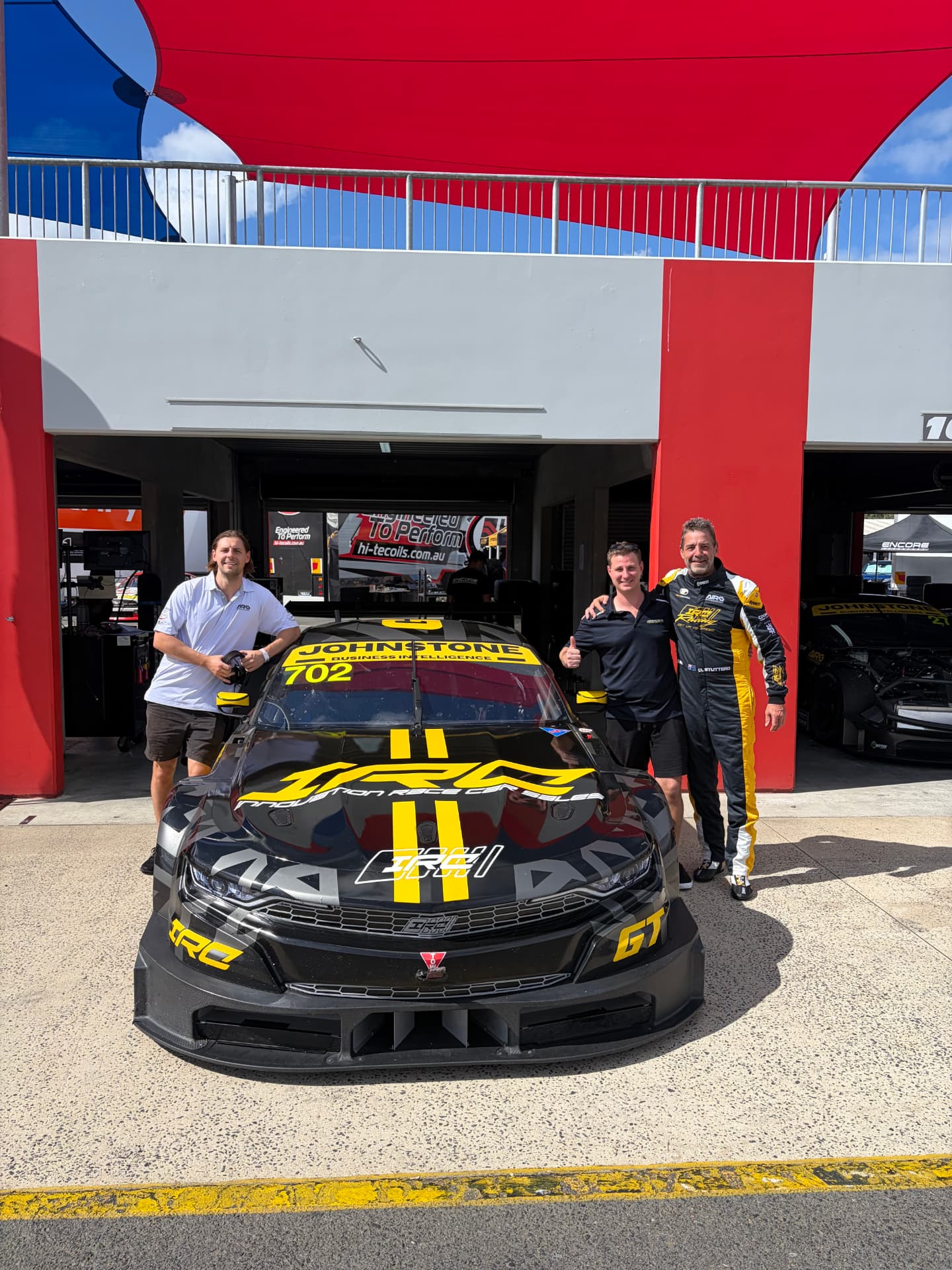 The Johnstone Business Intelligence backed Australian Innovation Race Car in pit lane with the team
