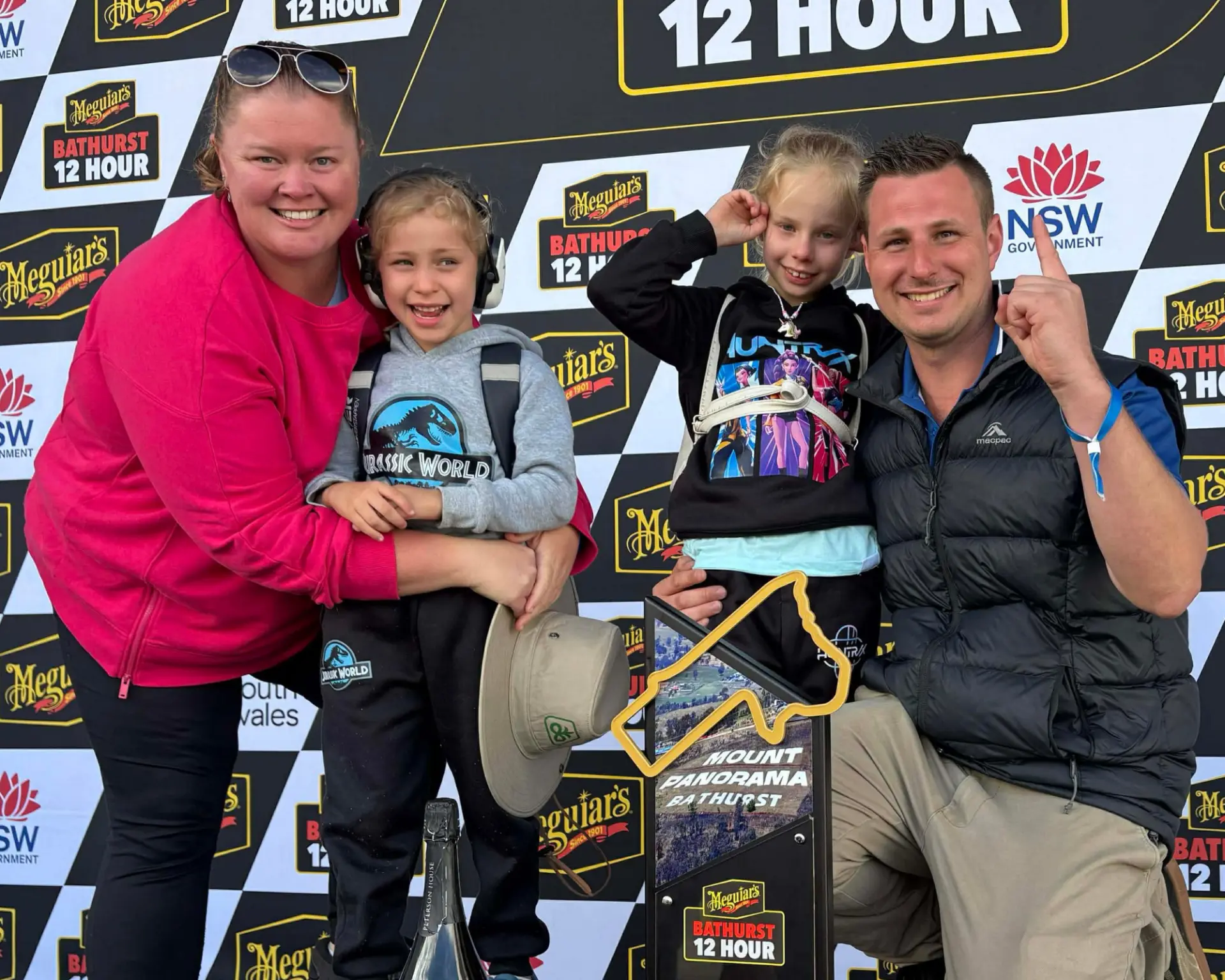 Ricky Johnstone with his family on the podium at the Bathurst 12 Hour